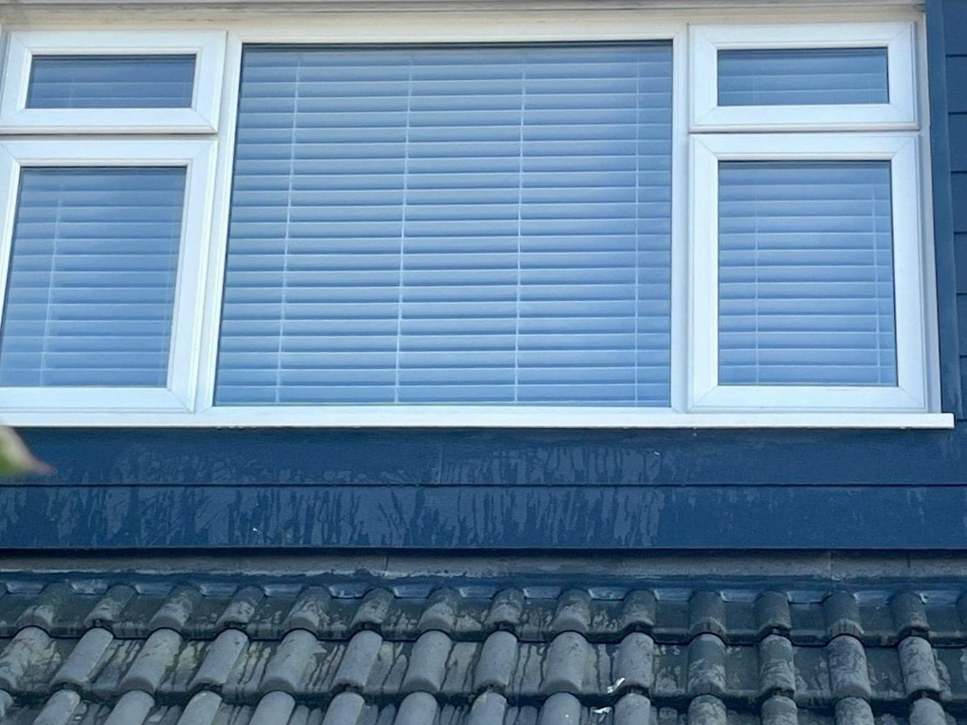 After — an upstairs dormer window at a Bristol home